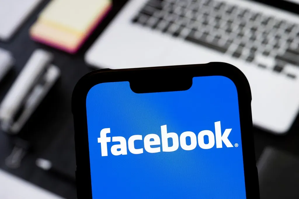 Facebook Logo on Phone
